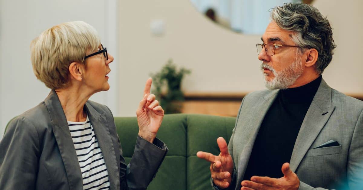 How To Talk To Your Spouse About Senior Living: A Gentle Approach That Works 1 Senior-Couple-Having-A-Serious-Conversation-About-Senior-Living
